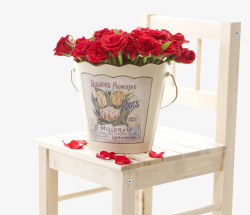 一桶玫瑰白色椅子上的一桶玫瑰花高清图片
