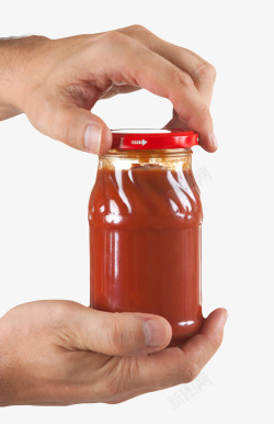 调味品玻璃瓶透明瓶子手拧着玻璃番茄酱包装实高清图片