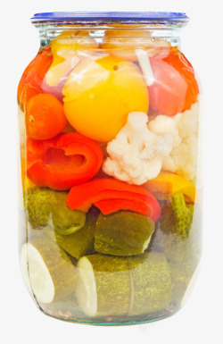 腌制罐子装满混合腌制蔬菜的透明广口瓶实高清图片