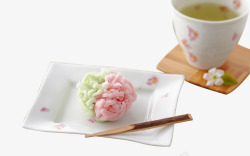彩色面团盘子里的樱花糕点高清图片