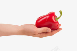 手指食物红色美味手捧着的红灯笼椒实物高清图片
