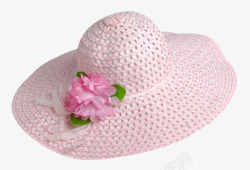 粉红色大红花粉红色遮阳绑着大红花的绑带草帽高清图片
