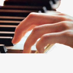 弹钢琴的手指特写摄影图素材