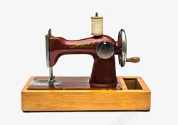 手工织布棕色木质底座手工缝纫机古代器物高清图片