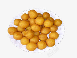白色淀粉花盘子里的黄金薯球高清图片
