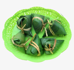 粽山绿色塑料盘里的粽子高清图片