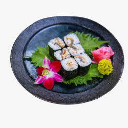 玫瑰花鳗鱼寿司黑色圆盘鳗鱼寿司食品餐饮高清图片