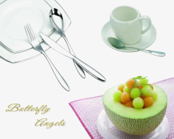 盘子茶杯餐具和水果高清图片