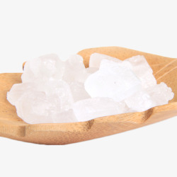 白色冰糖木盘子上的白色单晶冰糖高清图片