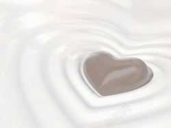 心形牛奶牛奶中的心形巧克力高清图片