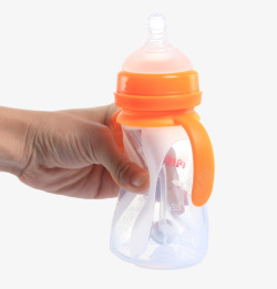 橙色手柄婴儿奶瓶高清图片